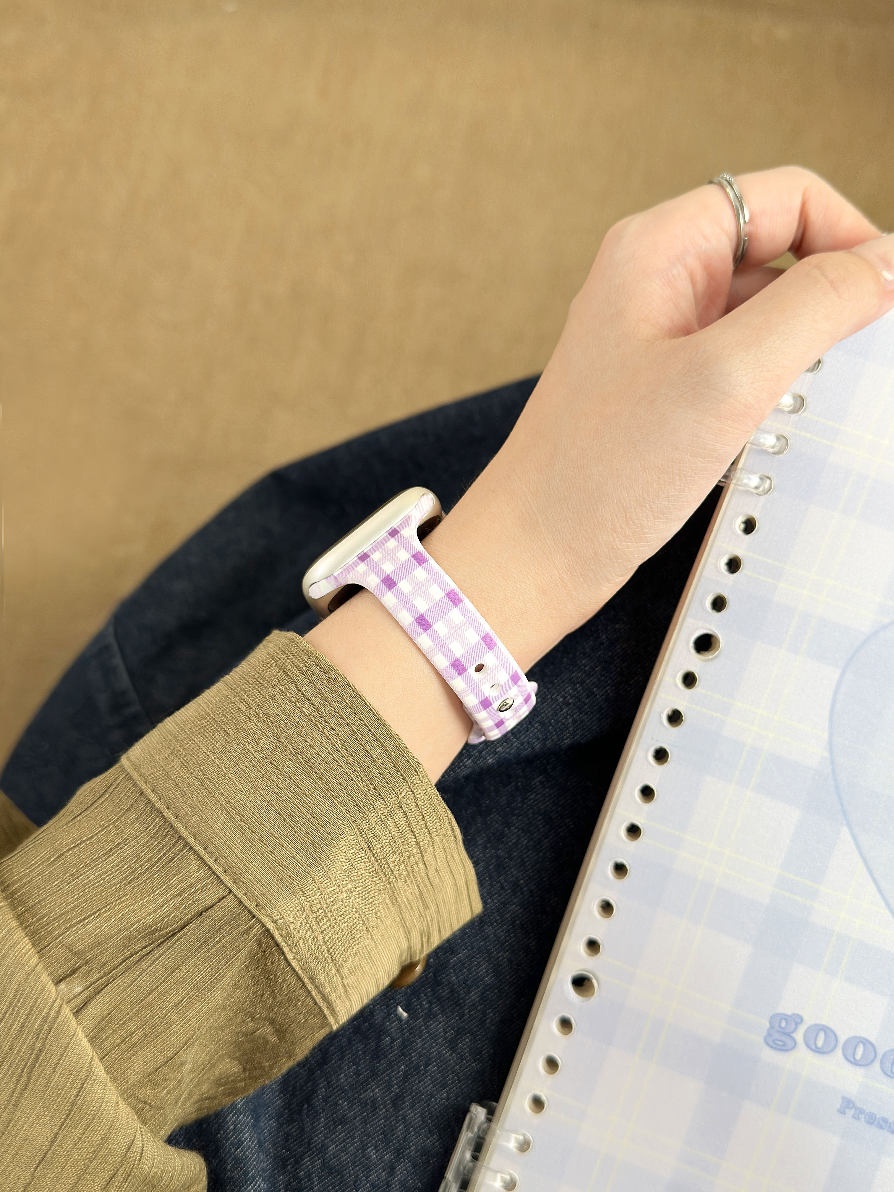 Purple plaid printed silicone Apple Watch band close view